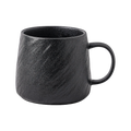 Black BRUNMIIA stone-texture ceramic mug with rounded profile and loop handle