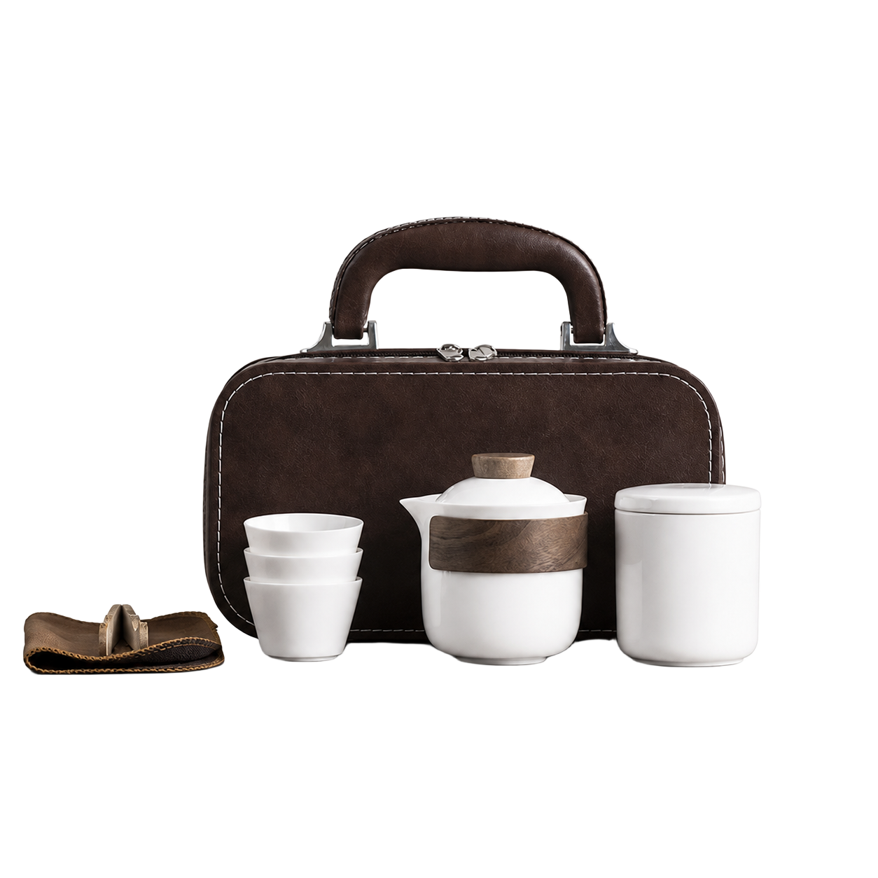 White ceramic travel tea set with teapot, three cups, lidded container, accessory wrap and brown carry case